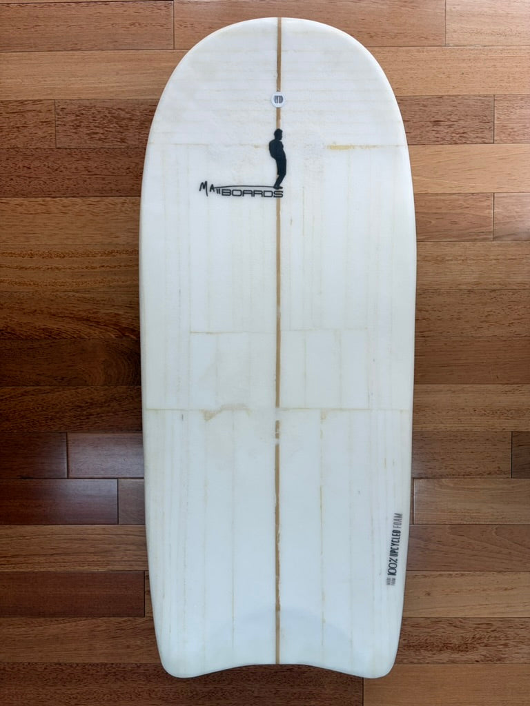 White body board with Matt Boards logo and graphic that says "Made from 100% Upcycled Foam"